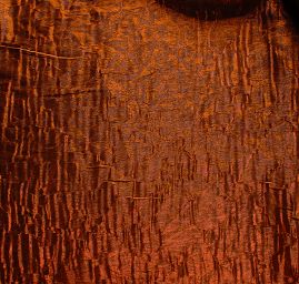 Lamé šatová látka kreš skořicová