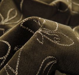 Pružný manšestr s výšivkou olivově zelený