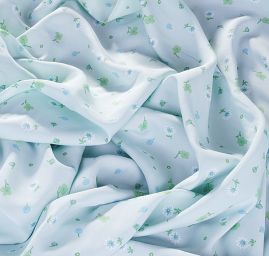 Viskozová letní látka kytičkový vzor světle zelená