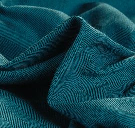 Kostýmová látka Art Fabrics rybí kost tyrkysová
