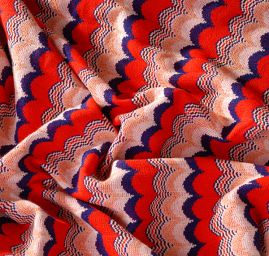 Efektní úplet vlnovky červený