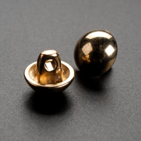 Knoflík kovový půlkulatý zlatý 14"