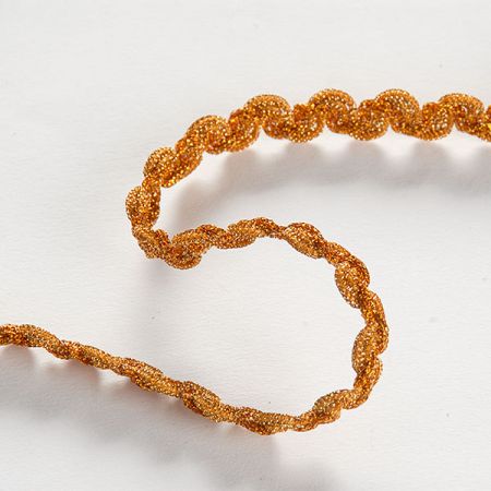 Prýmek leonský plná vlnka větší, zlaté barvy