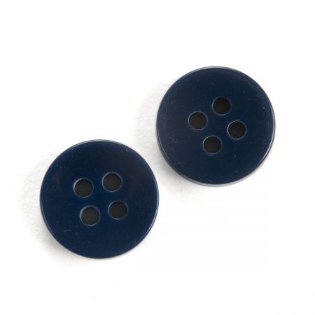 Knoflík plastový kulatý košilový modrobílý 26"