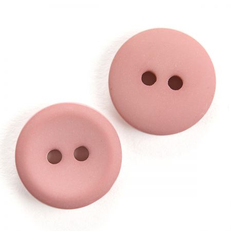 Knoflík plastový kulatý halenkový starorůžový 20"