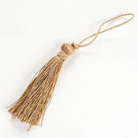 Střapec textilní odzobný zlatobéžové barvy