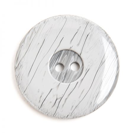 Gombík plastový dvojdierkové sivý melír