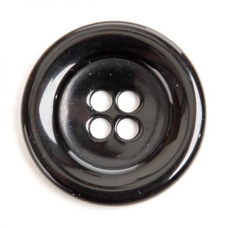 Gombík plastový čtyřdírkový čierny lem