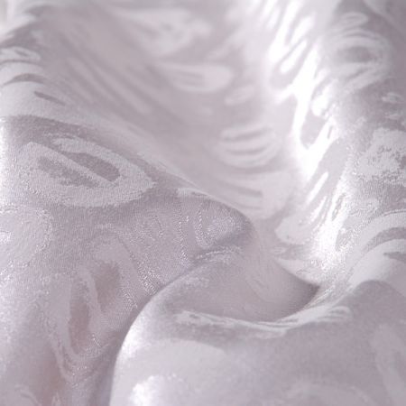 Pružná žakárová látka brokát smetanový