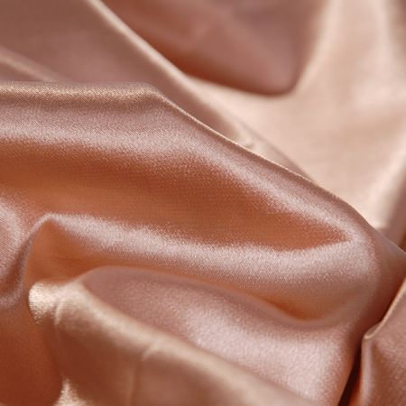 Sáten pružný jemný barva zlatá tmavá