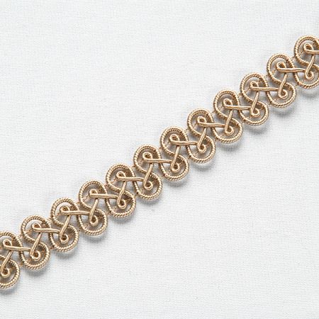 Oděvní prýmek šedobéžový