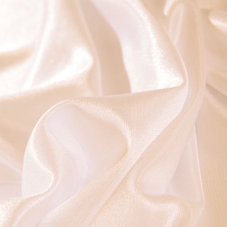 Podšívka pružná pleteninová meruňkové barvy