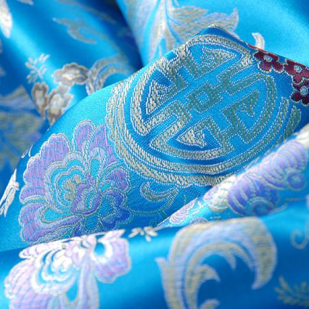 Látka brokát orientální motiv tyrkysový