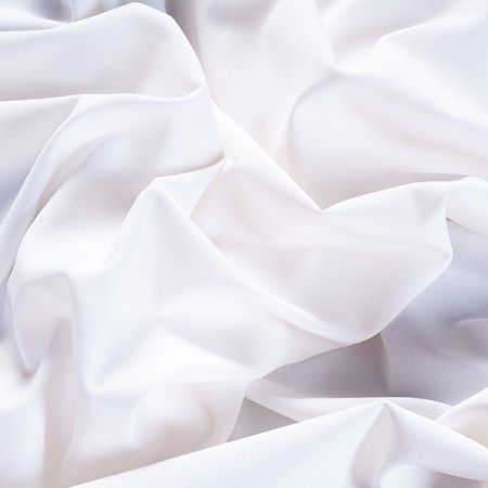 Kostýmová krepová látka vo farbe slonvé kosti