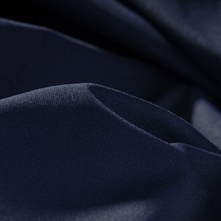 Pružná látka směs temně modrá