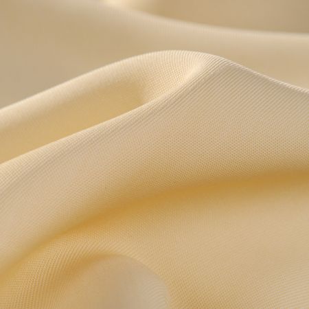 Látka viskoza směs hladká pastelově žlutá