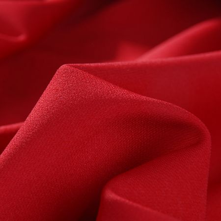 Pružná hladká látka směs červená