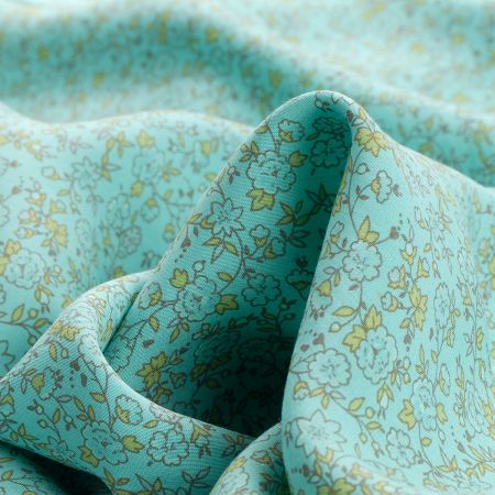 Viskozová letní látka kytičkový motiv mint/žlutá