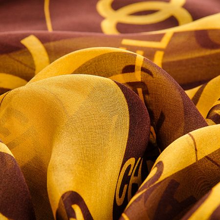 Hedvábný šifon geometrický vzor okrová/hnědá