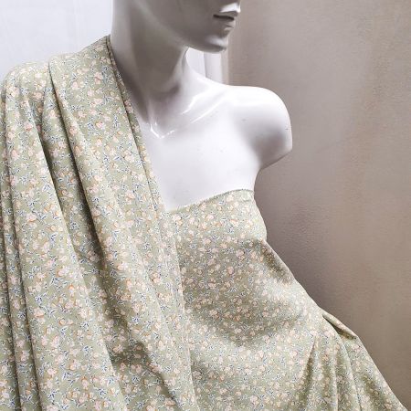 Viskozová šatová látka tisk drobné květy sv. zelená