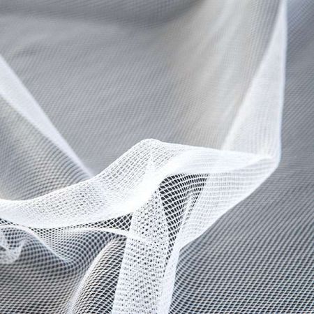 Tyl měkčený jemný slonová kost