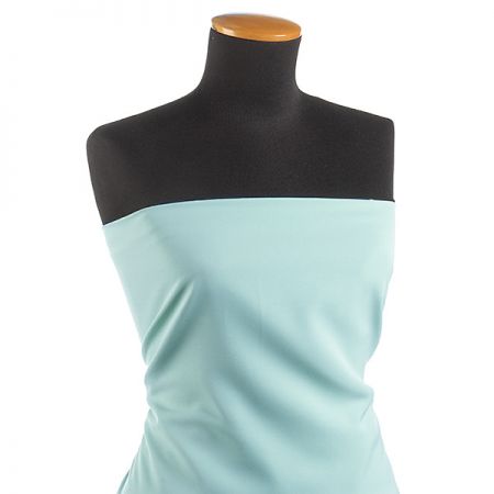 Kostýmová letní látka pastel sv. zelená