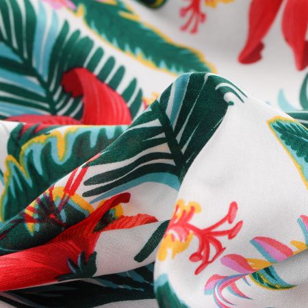 Viskozová šatová látka tropické květy bílá