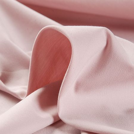 Viskozová šatová látka pružná pastel starorůžová