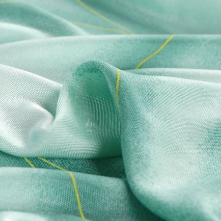 Úplet jemný v zelených barvách