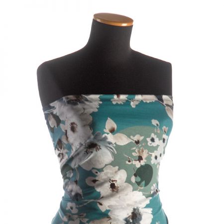 Letní úplet květy hadí kůže petrolej