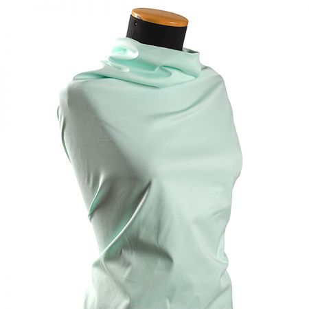 Pružná bavlněná látka pastel pistácie