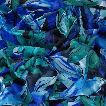 Hedvábný šifon květinový motiv modrozelený