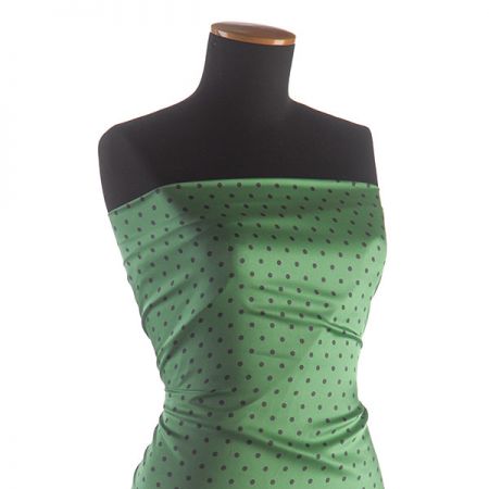 Šatová látka mikado puntík zelený/černý