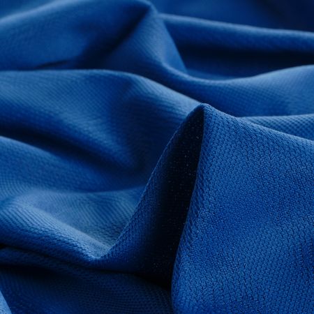 Pletenina s plastickým vzorem vlnek v pruzích modrá II.jakost