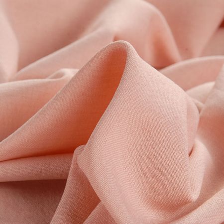 Kostýmová pružná látka imitace lnu pudrově řůžová