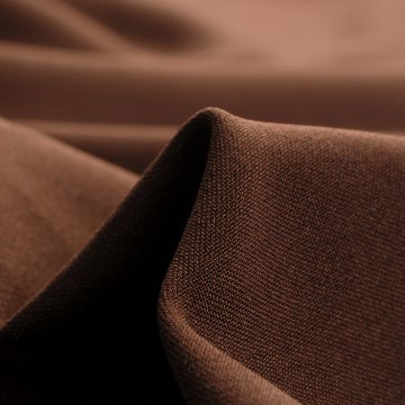 Kostýmová pružná látka tmavě hnědá