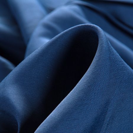 Viskozová šatová látka tmavě modrá