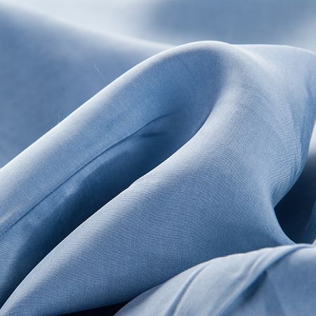Viskozová šatová látka pastel modrá