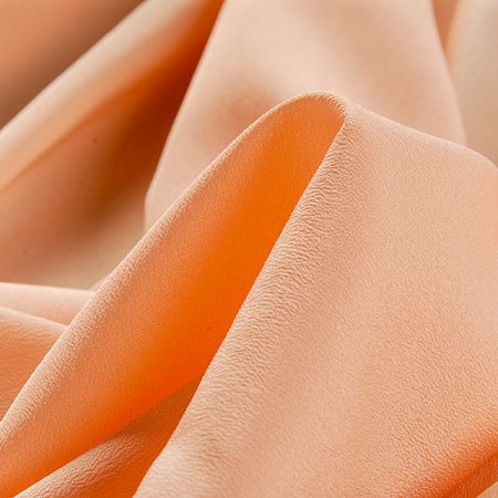 Krepdešín imitace hedvábí meruňkové barvy