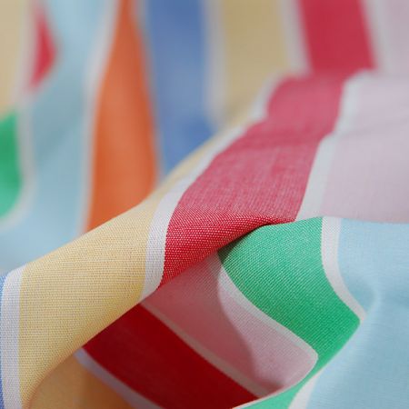 Bavlněná látka proužky pastelové barvy duhy