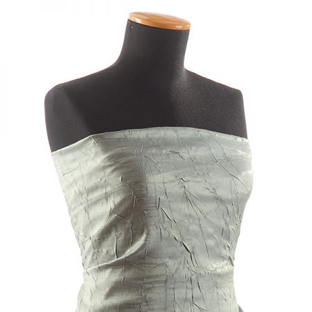 Lamé šatová látka zelenomodrá