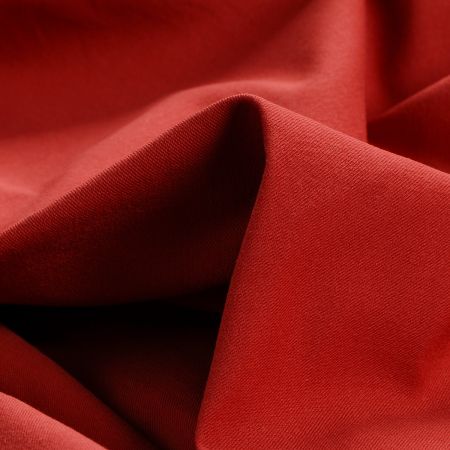 Bavlněná kostýmová látka cihlově červená II.jakost