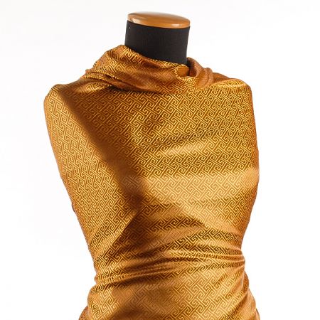 Brokát geometrický motiv zlatohnědý