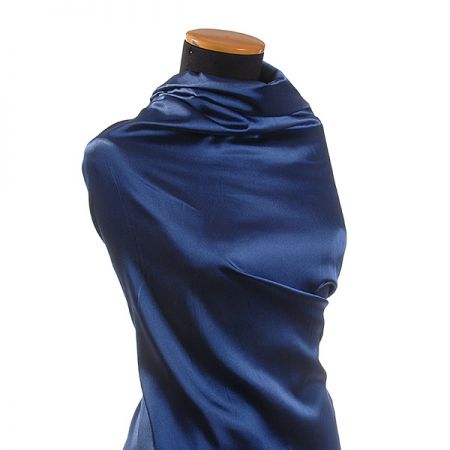 Pružný satén tm. modrý II. jakost vhodný na podšívku