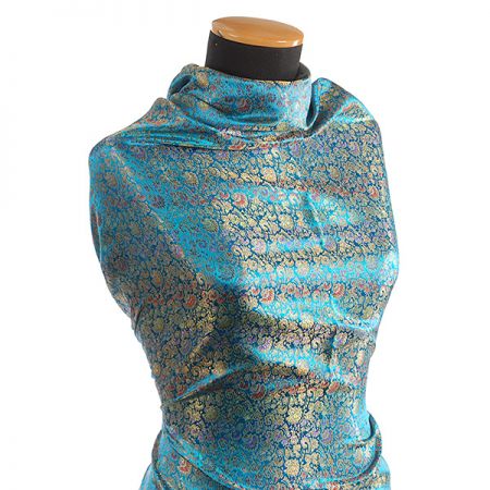 Látka brokát zlatý orientální motiv na tyrkysovém podkladu