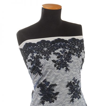 Krajka jemná výšivka na vzorovém tylu tm.modrá