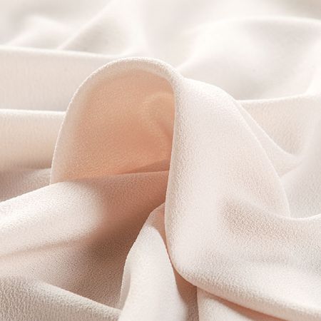 Krepdešín oboustranně pružný těžší béžový