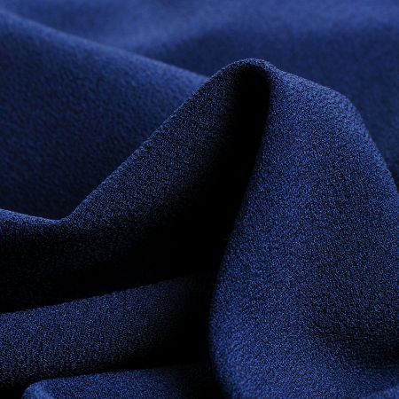 Krepdešín oboustranně pružný těžší tmavě modrý