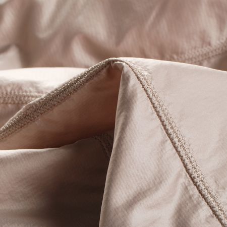 Prošev zateplená podšívka zdobý pruh béžový