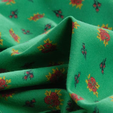Bavlněná látka drobné květy zelená
